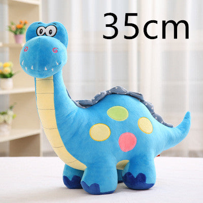 Soft dinosaur cuddle toy, held in hand for scale